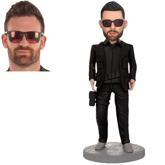 Custom Bobblehead: Cool Man in Black Suit - A sleek bobblehead featuring a dapper man in a black suit, customizable with engraved text for a personalized touch.