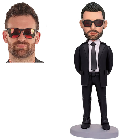 Business Man with Hands Behind Custom Bobblehead Accompanied by Inscribed Text